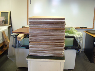 Stack of sheets to be dried with blotters